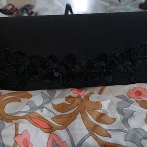 Elegant Black Clutch with Floral Embellishments